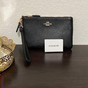 Coach retail leather black wristlet with gold hardware